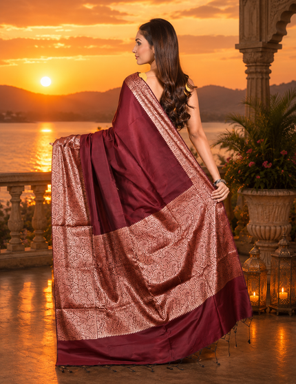 Maroon handwoven cotton zari saree back view with pallu spread showing copper-rose zari border