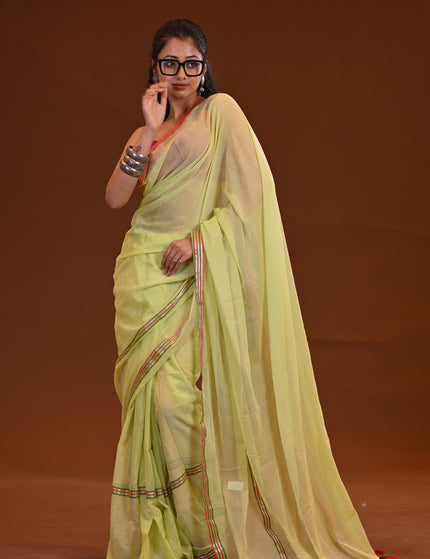 Yellow Mulmul Saree With Dual Tone Border And Tassels