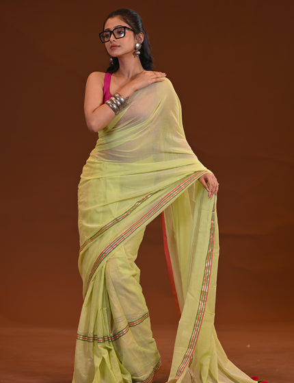 Yellow Mulmul Saree With Dual Tone Border And Tassels