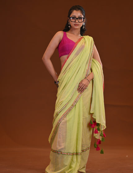 Yellow Mulmul Saree With Dual Tone Border And Tassels