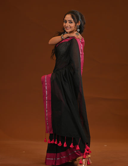 Black Mulmul Cotton Saree With Pink Border And Tassels
