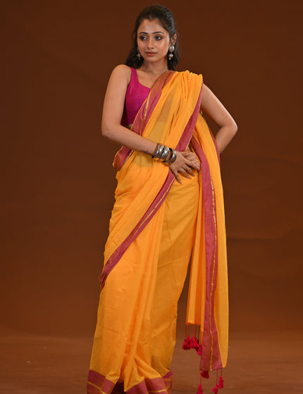 Yellow Mulmul Cotton Saree With Pink Border