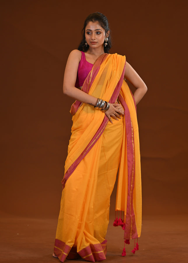 Yellow Mulmul Cotton Saree With Pink Border
