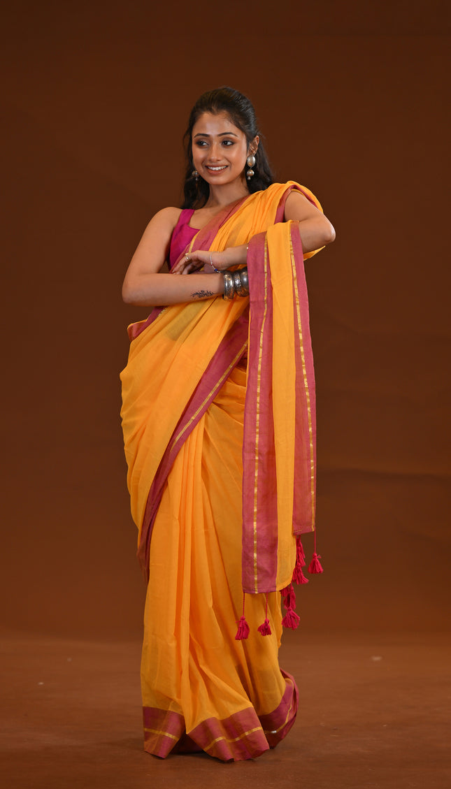 Yellow Mulmul Cotton Saree With Pink Border
