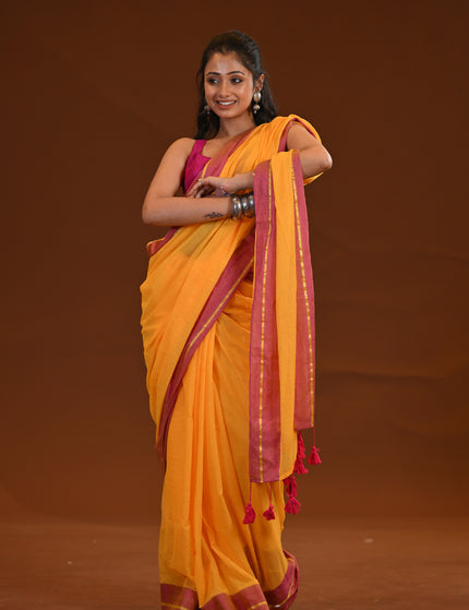 Yellow Mulmul Cotton Saree With Pink Border