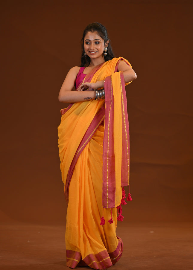 Yellow Mulmul Cotton Saree With Pink Border