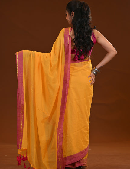 Yellow Mulmul Cotton Saree With Pink Border