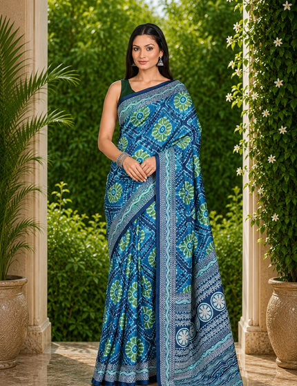 Teal mercerised ikkat silk saree with green floral motifs, draped front view on model - KalamKantha

