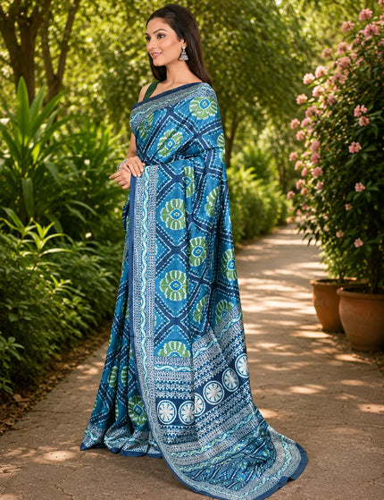 Teal mercerised ikkat silk saree side view showing full drape, pleats and printed pallu fall - KalamKantha