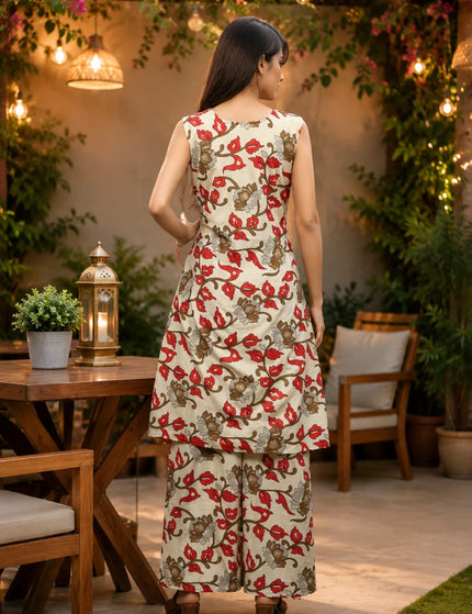 Full-length back view of the ivory cotton kurti and matching gol palazzo showing the red and brown floral print